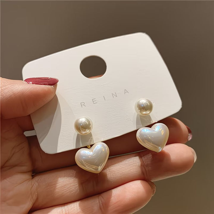 Herzohrringe mit Doppelperle