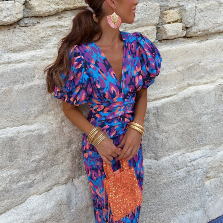 CAROLE | VIBRANTES FIESTA-KLEID MIT IMPOSANTEN DETAILS