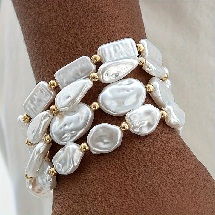 Set aus 4 Armbändern mit Perlen