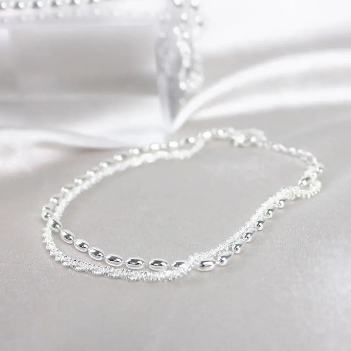 Elegantes Armband-Set aus Silber mit Zirkonsteinen
