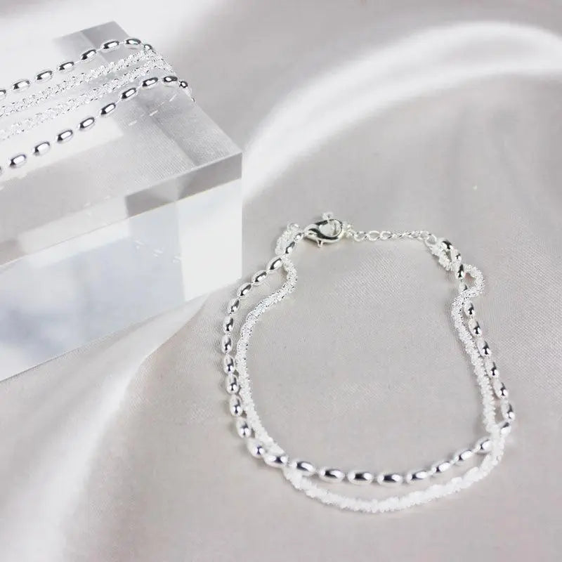 Elegantes Armband-Set aus Silber mit Zirkonsteinen