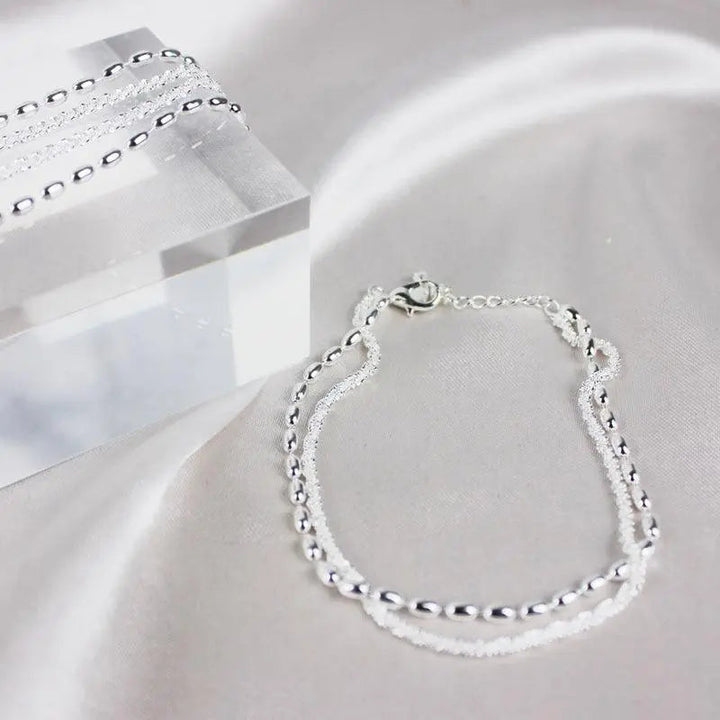 Elegantes Armband-Set aus Silber mit Zirkonsteinen