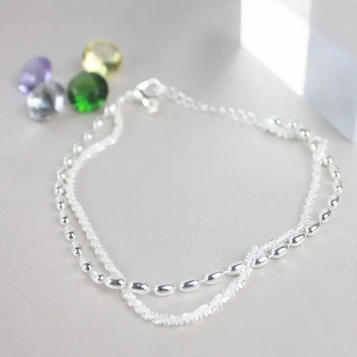 Elegantes Armband-Set aus Silber mit Zirkonsteinen