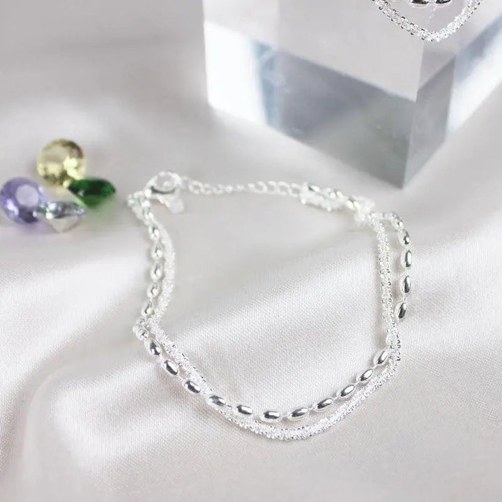 Elegantes Armband-Set aus Silber mit Zirkonsteinen