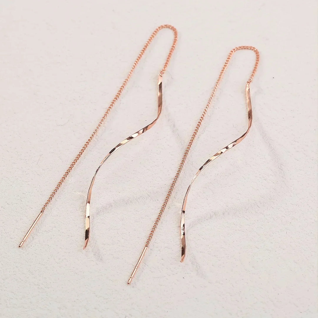 Lange Ohrringe mit Wellen-Design