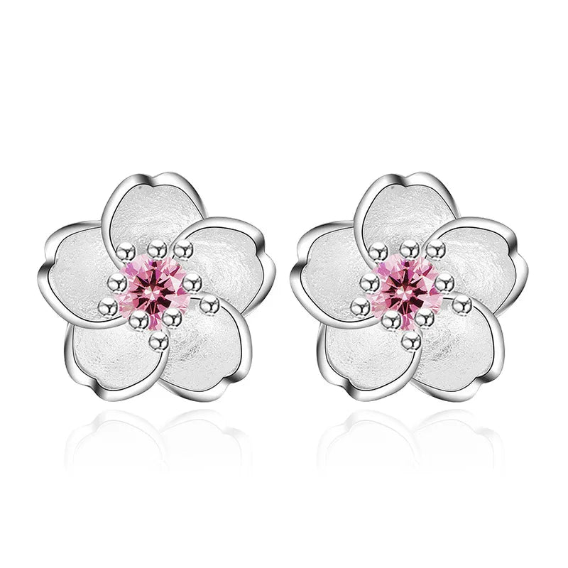Blumenförmige Ohrstecker mit Zirkonias