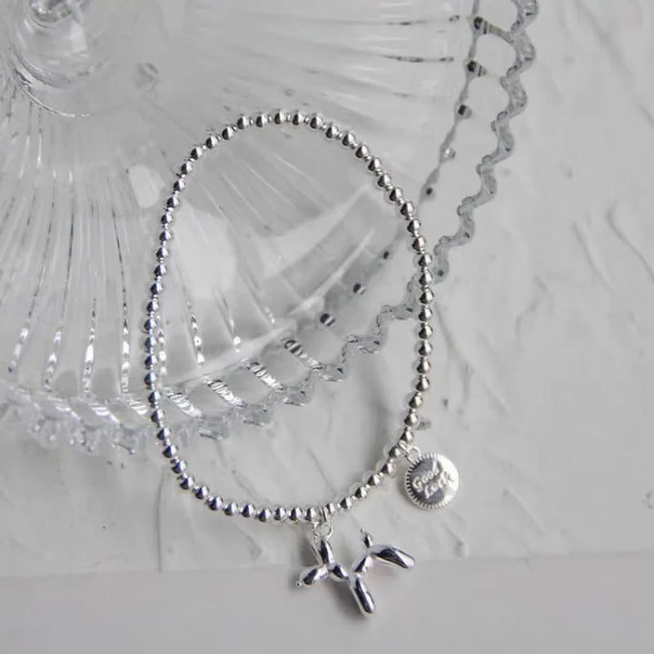 runder Armband mit Ballonhund