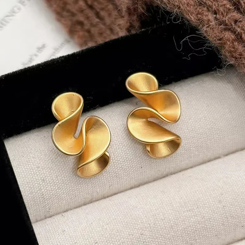 Ohrringe aus Silber und 18K Gold