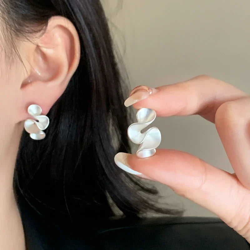 Ohrringe aus Silber und 18K Gold