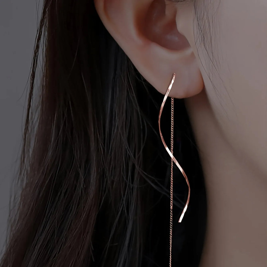 Lange Ohrringe mit Wellen-Design