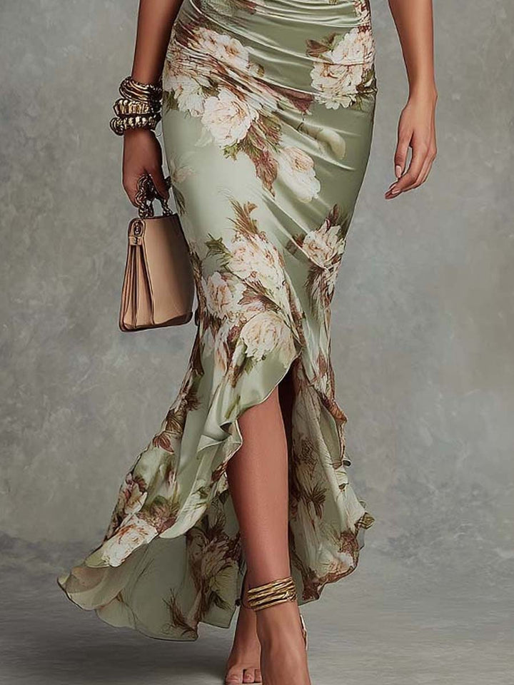 Anna - Asymmetrisches langes Kleid aus grünem Satin mit V-Ausschnitt, schwingenden Puffärmeln und floralem Muster