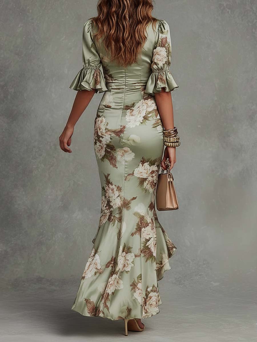 Anna - Asymmetrisches langes Kleid aus grünem Satin mit V-Ausschnitt, schwingenden Puffärmeln und floralem Muster