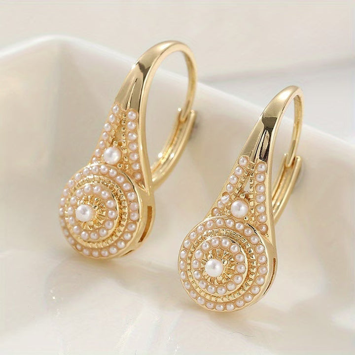 Elegante Ohrringe mit Perlen
