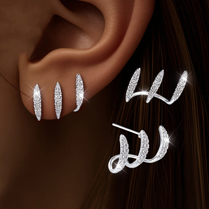 Elegante Ohrringe mit drei Krappen und Strass