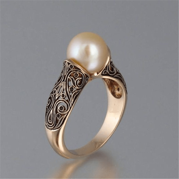 Vintage-Ring aus Perle und zeitlosem Gold